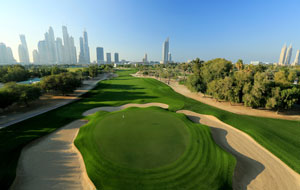 green surrounded by bunker, emirates golf club majlis course, dubai, united arab emirates