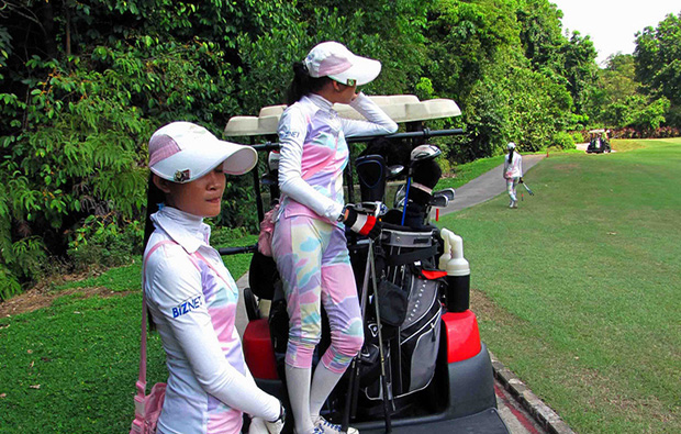 caddies waiting, riverside golf club, jakarta, indonesia