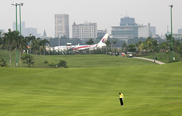 airplane at tan son nhat golf course, ho chi minh,vietnam