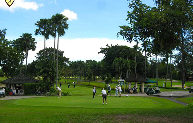 Putting out at Cebu Golf Country Club, Cebu, Philippines