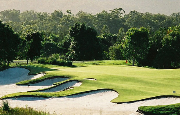 Green surrounded by trees at The Glades Golf Club, Gold Coast, Australia