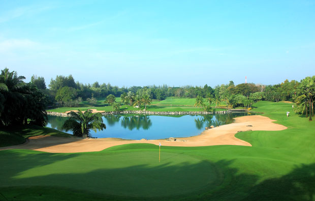 bunkers and water hazzard at alpine golf sports club, bangkok, thailand