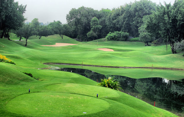 undulating fairways at alpine golf sports club, bangkok, thailand