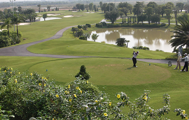 teeing off, long thanh golf resort, ho chi minh, vietnam