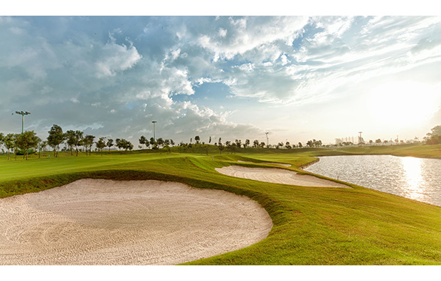 bunkers and water hazard,  long bien golf course, hanoi, vietnam