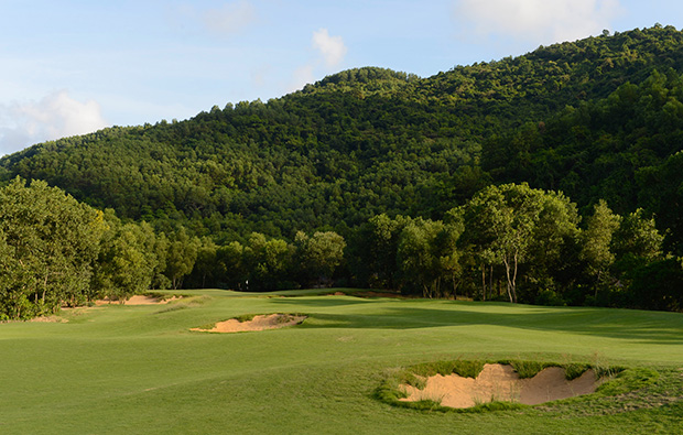 fairway and distant green, laguna lang co golf club, danang, vietnam