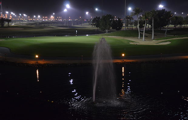 night golf at tower links golf club, dubai, united arab emirates