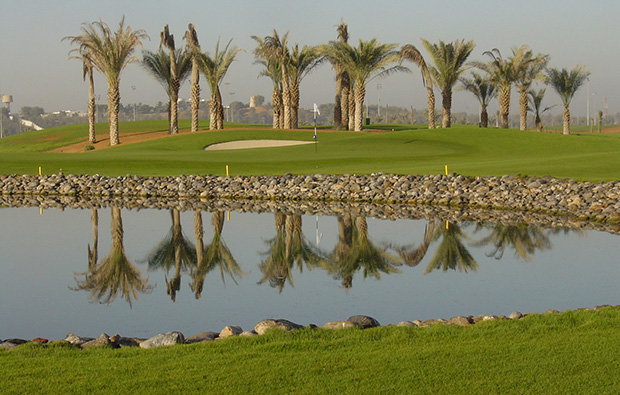 water hazard at tower links golf club, dubai, united arab emirates